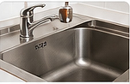 Kitchen sink and faucet for drain cleaning service